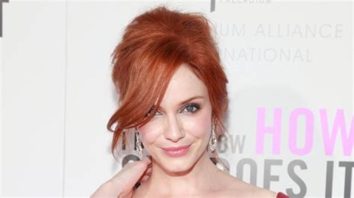 Christina Hendricks barely contains herself in tiny corset in jaw-dropping new photos